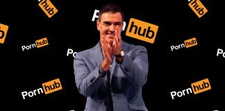 Spain to Lock Down Adult Content for Minors parody image of Pedro Sanchez standing in front of a pornhub photo wall